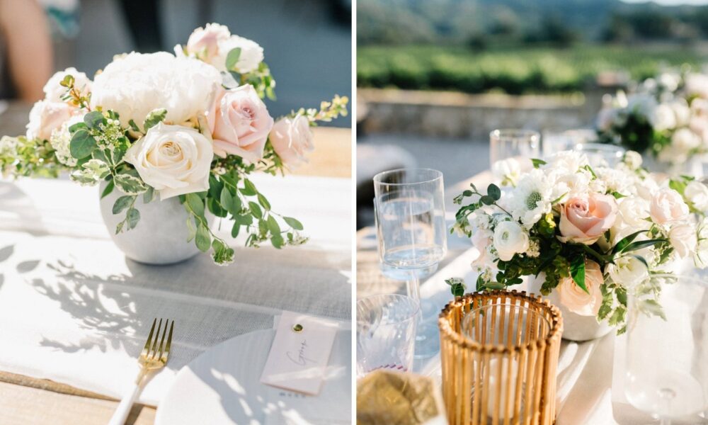 An elegant table setting with floral centerpiece at an outdoor event.